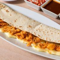 Tinga De Pollo (Chicken Tinga) Quesadilla · Homemade thin corn tortilla with melted Monterrey Jack cheese and chicken tinga. Served with...