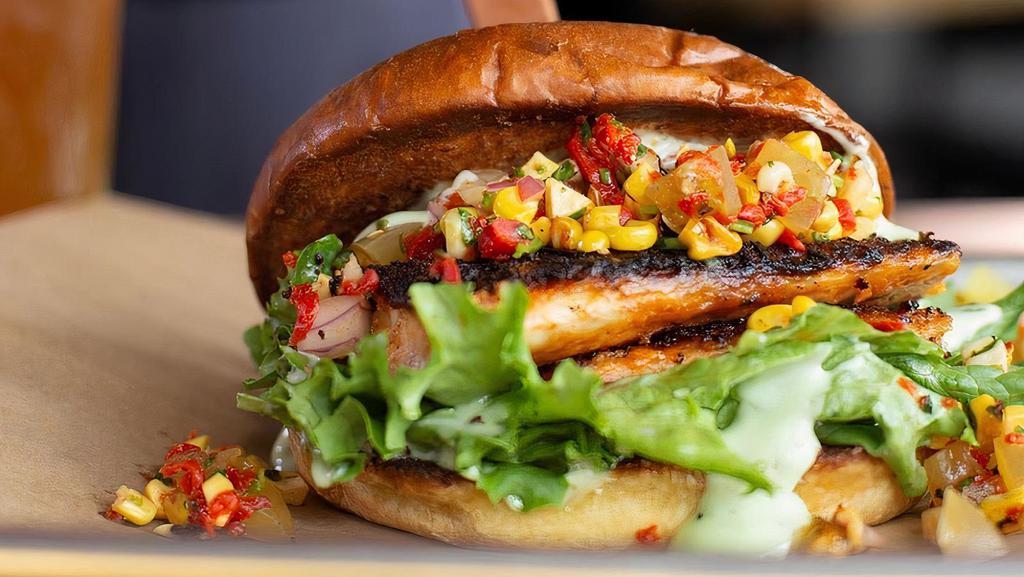 Blackened Fish Sandwich · Cajun Spice Crusted Redfish, Tartar Sauce, Lettuce
Grilled Corn Salsa with Pickled Green Tomatoes, Challah Bun. Served with French Fries