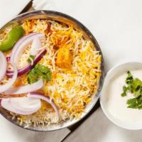 Paneer Biryani · Cheese cubes cooked in basmati rice with special herbs and spices.