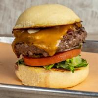 Amboy - Just The Burger · Akaushi beef, bacon, cheddar, green leaves, tomato, onions, pickles, ketchup, houseblend mayo.