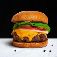Cheese, Please! Burger · American beef patty cooked medium rare and topped with melted cheese, buttered lettuce, toma...