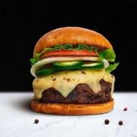 Hola Jalapeno Burger · American beef patty cooked medium rare and topped with melted pepper jack cheese, jalapenos,...