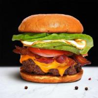 Rise & Shine Burger · American beef patty cooked medium rare and topped with bacon, fried egg, avocado, melted che...