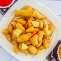 Sweet & Sour Chicken · Breaded chicken cubes deep-fried and topped with a sweet and sour sauce and vegetables.