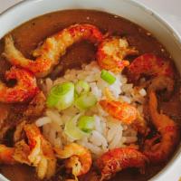 Crawfish Etouffée · Thick, butter roux with crawfish tails, sweet peppers and white rice.