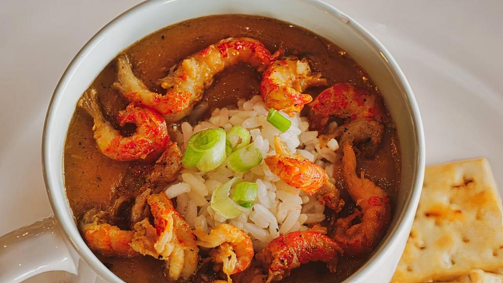 Crawfish Etouffée · Thick, butter roux with crawfish tails, sweet peppers and white rice.
