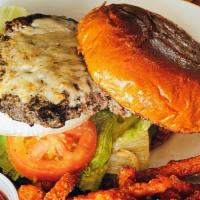 Bayou Burger · Blackened beef patty, lettuce, tomato, pickle, onion, Jack cheese and chipotle mayo on a gri...