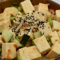 Sweet Chili Tofu · Marinated with grilled scallions and sweet chili sauce.
Toppings: Cucumber, edamame , sweet ...