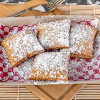 4Pc Beignets · New Orleans Style Beignets deep fried and dusted in powdered sugar.