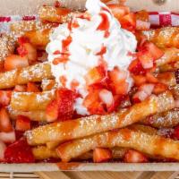 Strawberry Funnel Cake Fries · Our Funnel Cake Fries, covered in powdered sugar, topped with fresh cut strawberries, our pr...