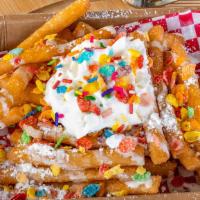 Fruity Pebbles Funnel Cake Fries · Sweet cream, sweet icing syrup, fruity pebbles, whipped cream topped with sprinkles.