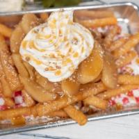 Apple Pie Funnel Cake Fries · Apple pie filling, cinnamon sugar, whipped cream, caramel syrup, and cinnamon streusel crunch.