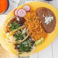 Taco Plate · Three soft corn tacos with your choice of meat, served with rice and beans/ Three tortillas ...