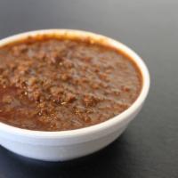 Cup Texas Chili (6 Oz) · House made Texas chili with our quality angus ground chuck beef, shiner bock beer and a hous...