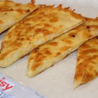 Cheese Quesadilla · 10' flour tortillas filled with shredded cheese only!