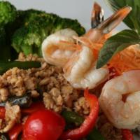 Shrimp And Chicken Basil · Minced chicken and shrimp stir-fried with bell pepper, fresh basil, broccoli Thai basil sauce.