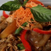 Pad Kee Mow · What's good. Wild rice noodles wok tossed with egg, garlic, chilies, bell pepper, tomatoes a...