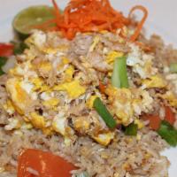 Crab Meat Fried Rice · Jasmine rice wok tossed with crabmeat, egg, onion and garlic.