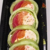 Naruto  · Salmon Tuna Avocado and Imitation Snow Crab inside Wrapped with Cucumber Drizzed with Chef S...