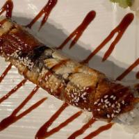 Dragon Roll · Crab, avocado, topped with eels with eel sauce.