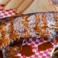 Giant Dino Beef Ribs · Made fresh daily, 1.5 lbs and prepared with our secret in house rub. The Dino Beef Ribs are ...