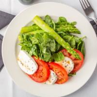 Caprese Salad · Fresh mozzarella, tomatoes, and basil.