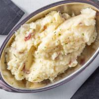 Garlic Mashed Potatoes · Traditional mashed potatoes with garlic butter.