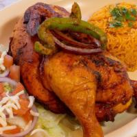 Half Rotisserie Chicken · Served with rice and salad.