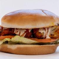 Yummies Zinger Chicken · Deep fried breaded zinger chicken served with lettuce, red onion, Swiss chees