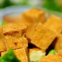 Fried Tofu (6 Pcs) · Nuts. Fried crispy bean curd. Served with sweet and sour sauce with ground peanuts.