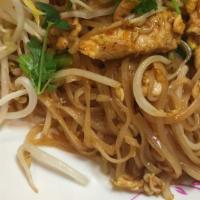 Pad Thai · Contain nuts. Stir-fried thin rice noodles with eggs, bean sprouts, scallions, and fried tof...