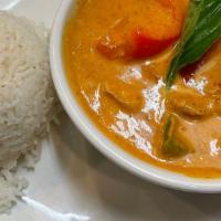 Panang Curry · Medium hot. Creamy panang curry with coconut milk, bell peppers, and lime leaves.