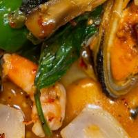 Spicy Seafood · Spicy. Medium hot. Stir-fried combination of seafood, chilies, onions, bell peppers, mushroo...