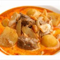 Yellow Curry Bundle · Yellow curry with coconut milk, potatoes, carrots, and onions. Served with your choice of Co...
