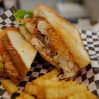#10 Southern Buffalo Scoota Sandwich · Natural chicken, signature sauced with scoota-bangz own batter, lettuce, tomatoes pickles, o...