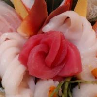 Chirashi · Assorted sashimi over sushi rice.
Include 1 Miso & House Salad