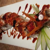 King Dragon Roll · California roll topped with Big Baked fresh water eel, Tobiko with Eel sauce.