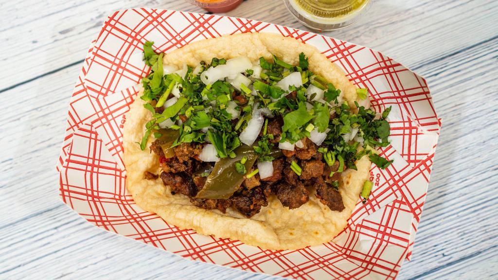 Tacos · With onion, cilantro, corn, or flour.