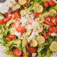 Strawberry Avocado Salad · Organic spring mix and kale salad, tomato, strawberry, avocado, squash, feta with home made ...