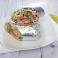 Falafel Sandwich  · Three falafel balls with parsley, peppers, pickles, tomatoes and tahini sauce, rolled in pit...