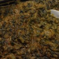 Saag Paneer · Mild and creamy.   Paneer cheese cooked in spinach and creamy tomato sauce.