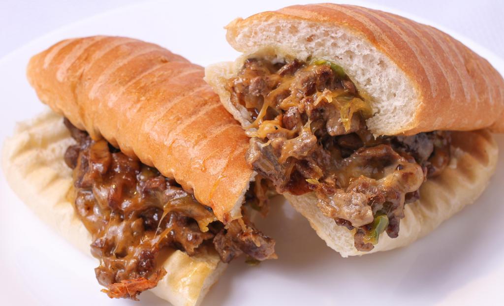 Philly Cheese Steak Sandwich · Grilled beef pieces with grilled onions, mushrooms, green peppers, cheese, and mayo