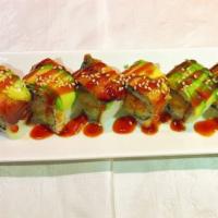Dragon Roll · (6-8 pc.) Shrimp tempura and cucumber. Topped with eel and avocado. *Cooked.
