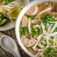 Phở Dặc Biệt/Special Combination · Rare beef , flank, brisket, tendon, tripe and meatball. Rare beef will be cook with the brot...