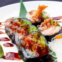 Shrimp Tempura Roll · Shrimp tempura, crabmeat, avocado, cucumber and eel sauce