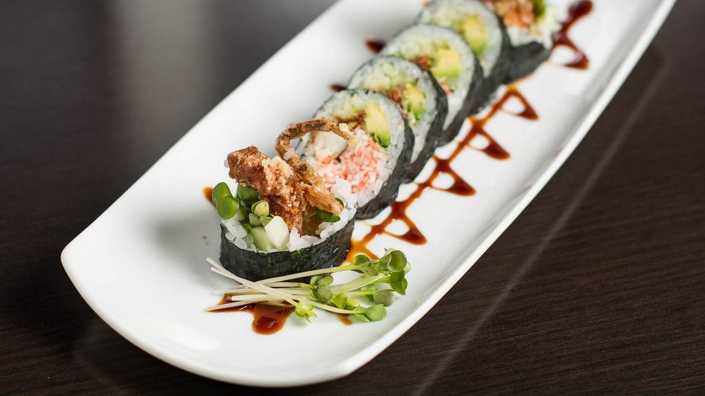 Spider Roll · Crispy soft shell crab, crabmeat, avocado, cucumber, radish sprouts and eel sauce