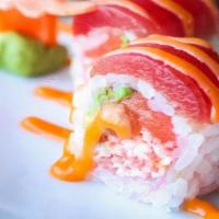 Charming Roll · Crabmeat, salmon, avocado,  wrapped with soy bean paper, topped with tuna and spicy mayo