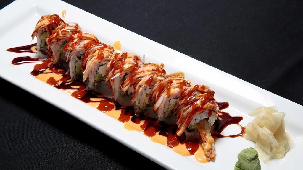 Sunny Roll · Shrimp tempura, avocado, cream cheese, crabmeat topped with eel sauce, chili sauce and spicy mayo