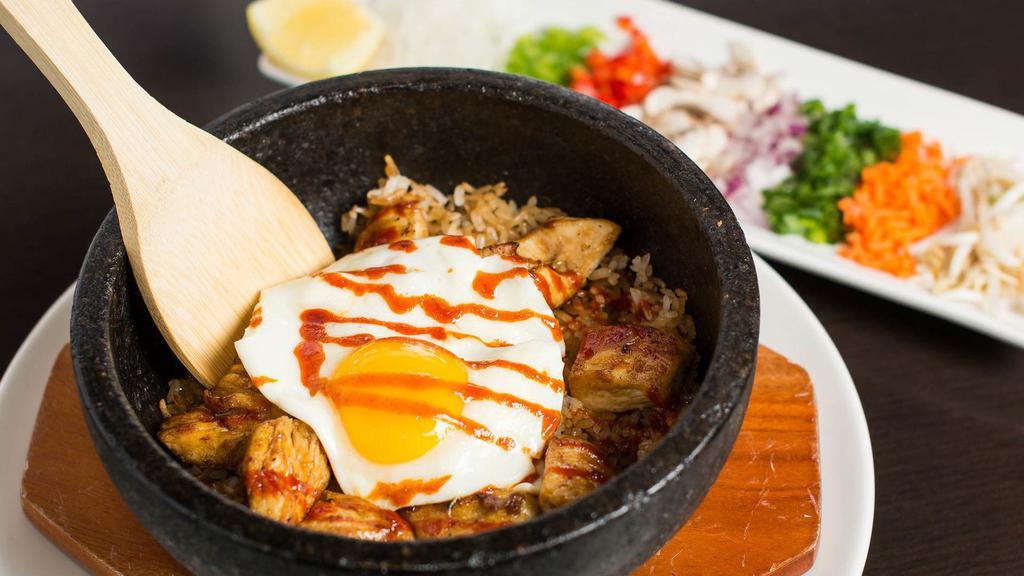 *Togo* Hot Stone Bowl · *All Mixed* Sizzling rice served with a sunny side up egg, selection of fresh vegetables and spicy sauce.