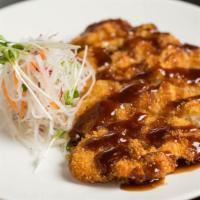 Chicken Katsu · Japanese style fried chicken breast served with steamed rice and Asian slaw.